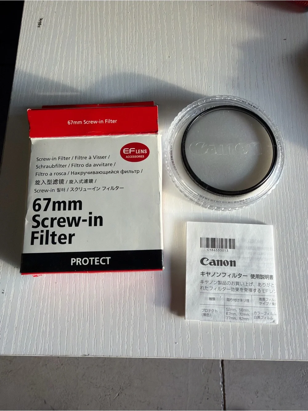 Canon 67mm Screw-In Filter with Original Packaging